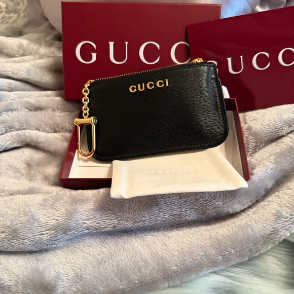 Gucci Black Leather Pouch with Gold Accents - Picture 1 of 8